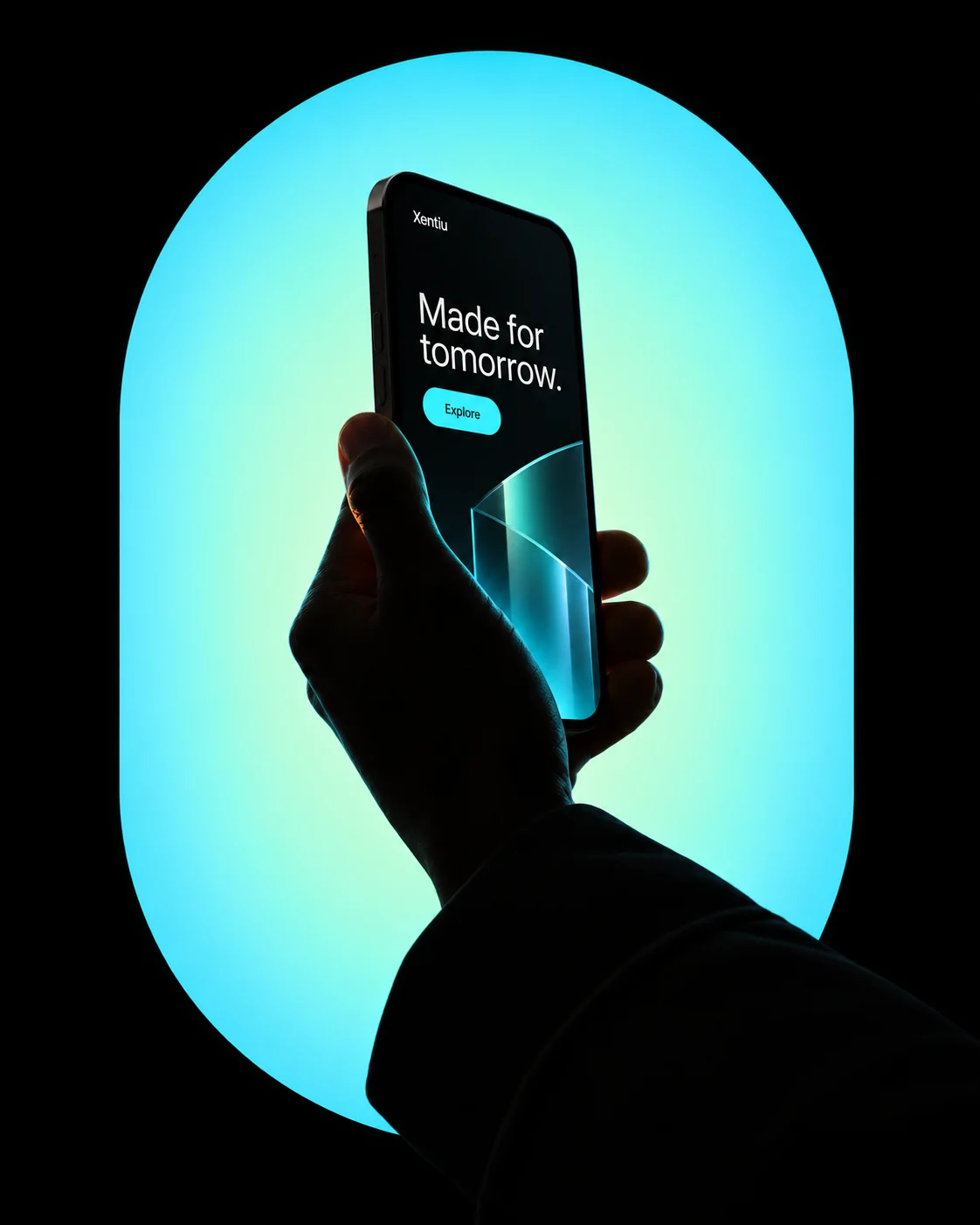A hand holding a phone displaying a Xentiu website, framed by a luminous cyan arch.